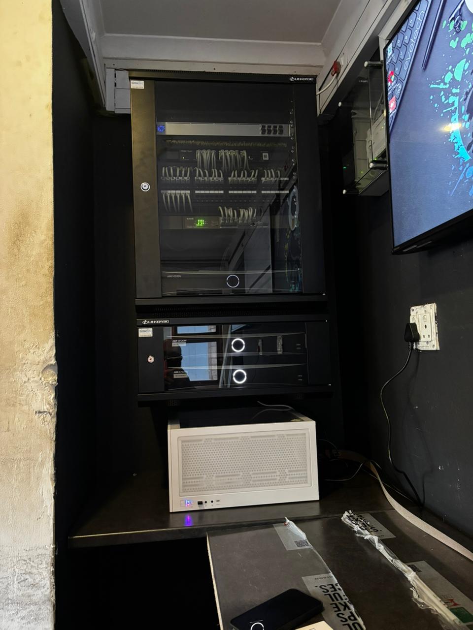 Completed indoor network cabinet with organised structured cabling